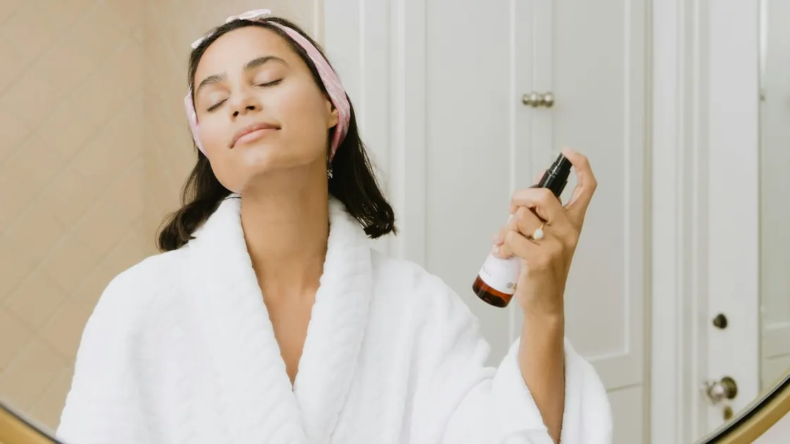 Applying skincare at home during recovery